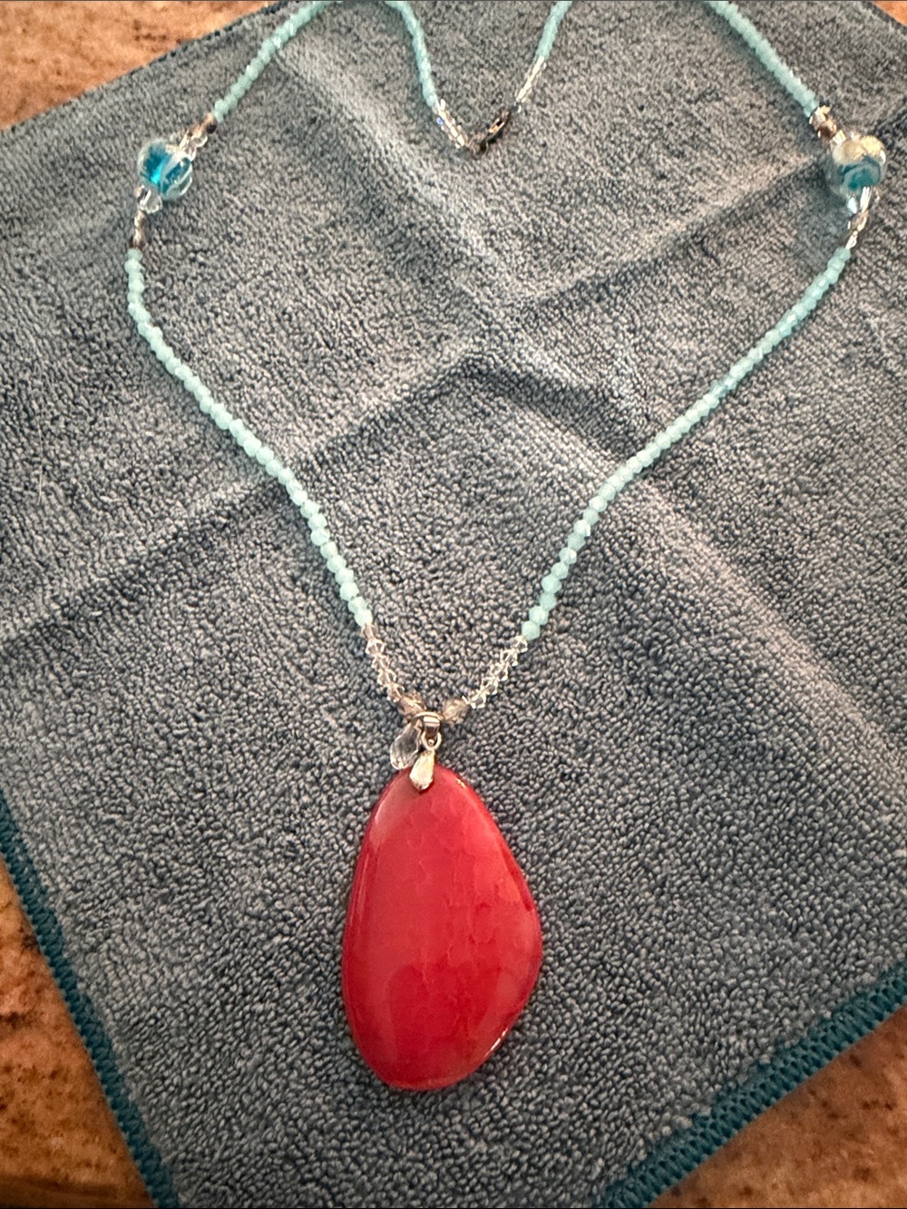 Turquoise Beaded Necklace with Coral Red Teardrop Pendant